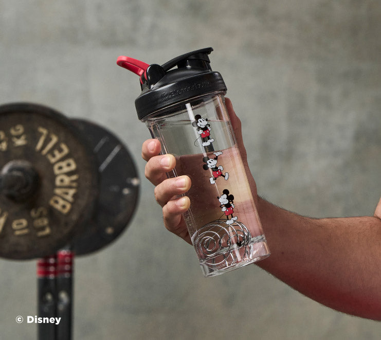 pro-series-r4 Mickey_Mouse_Protein_Shaker_Bottle_Being_Held_In_the_Gym.jpg